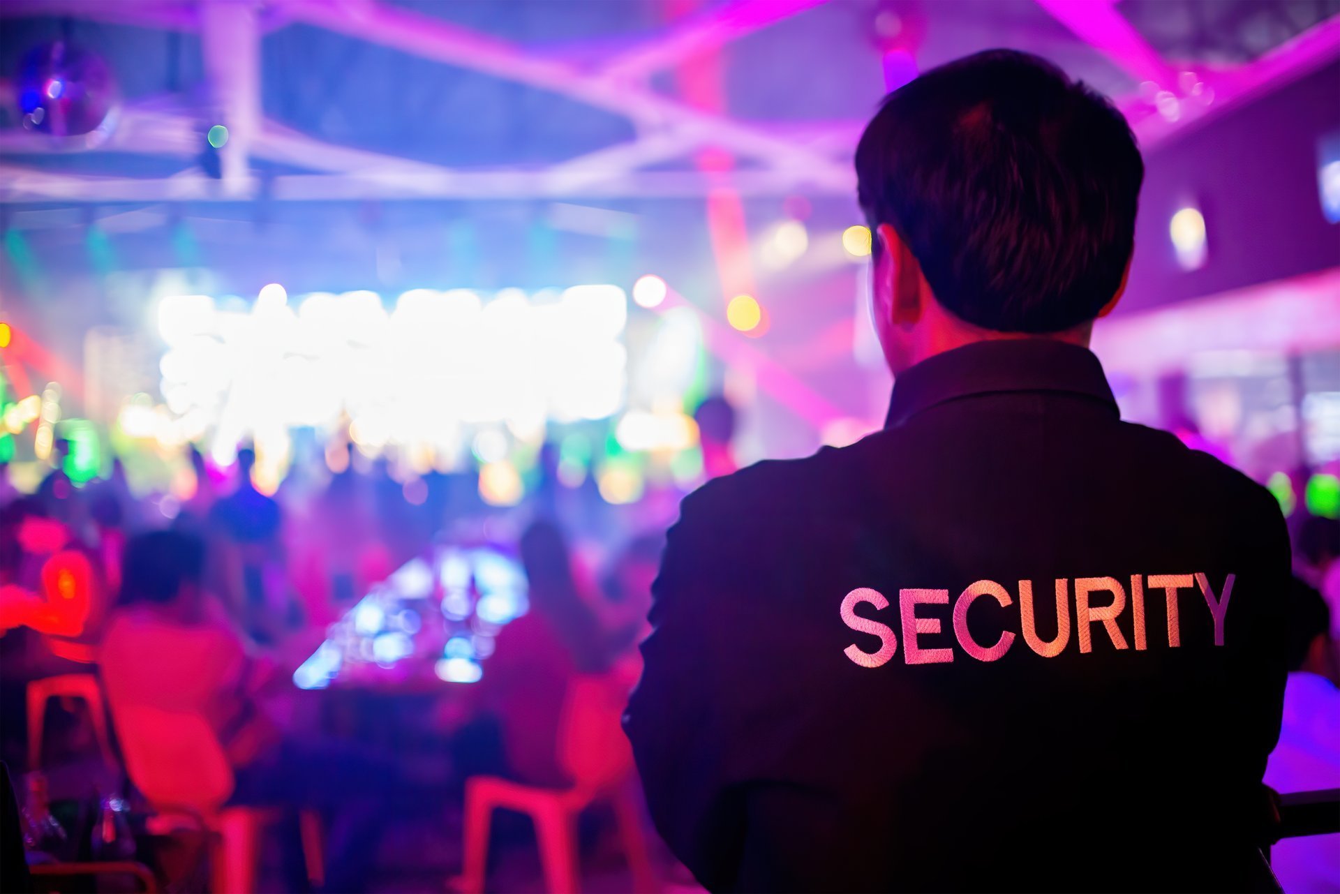 Security guard regulating safety at event concert